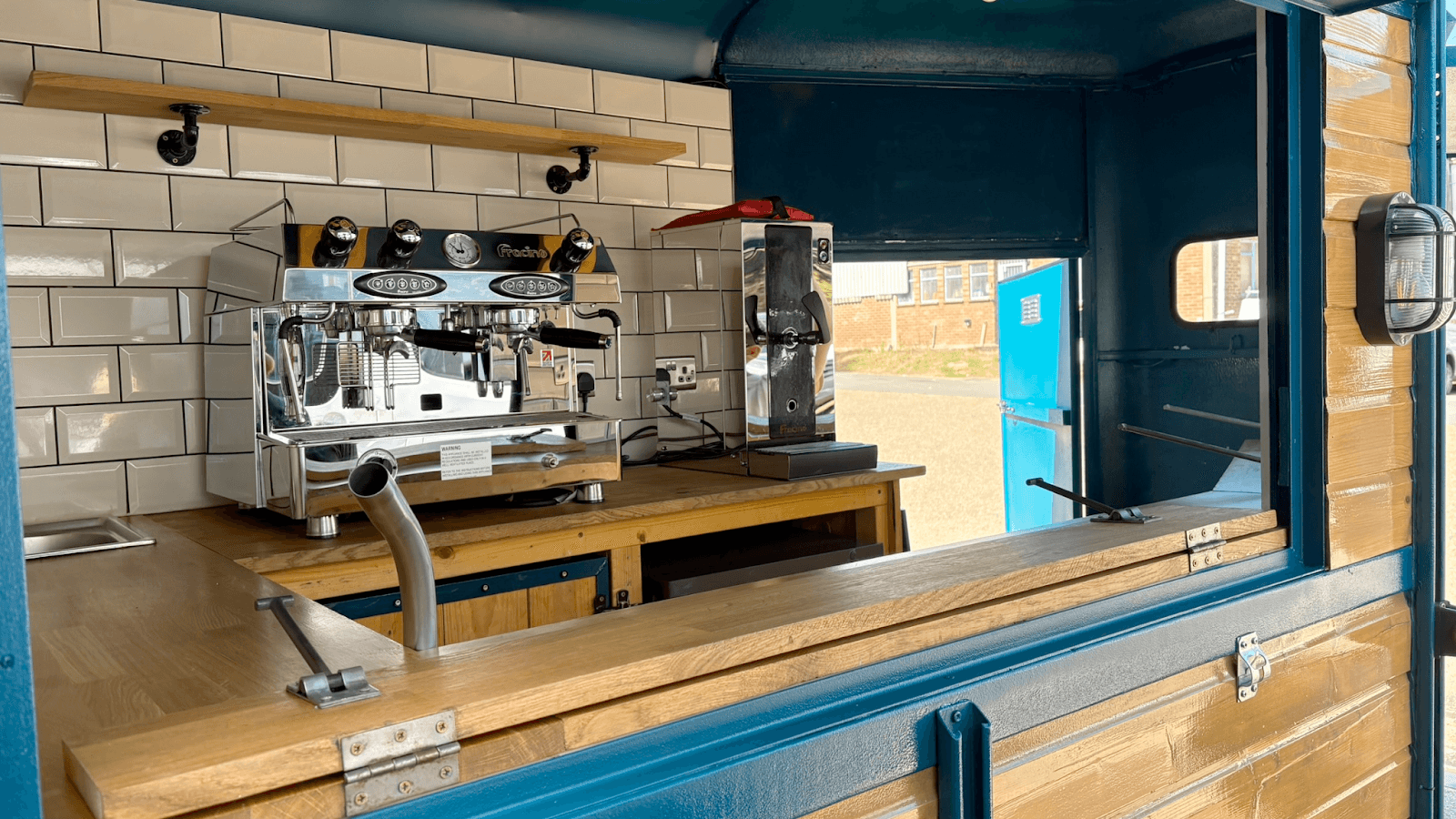 Coffee machine installed inside a converted vehicle