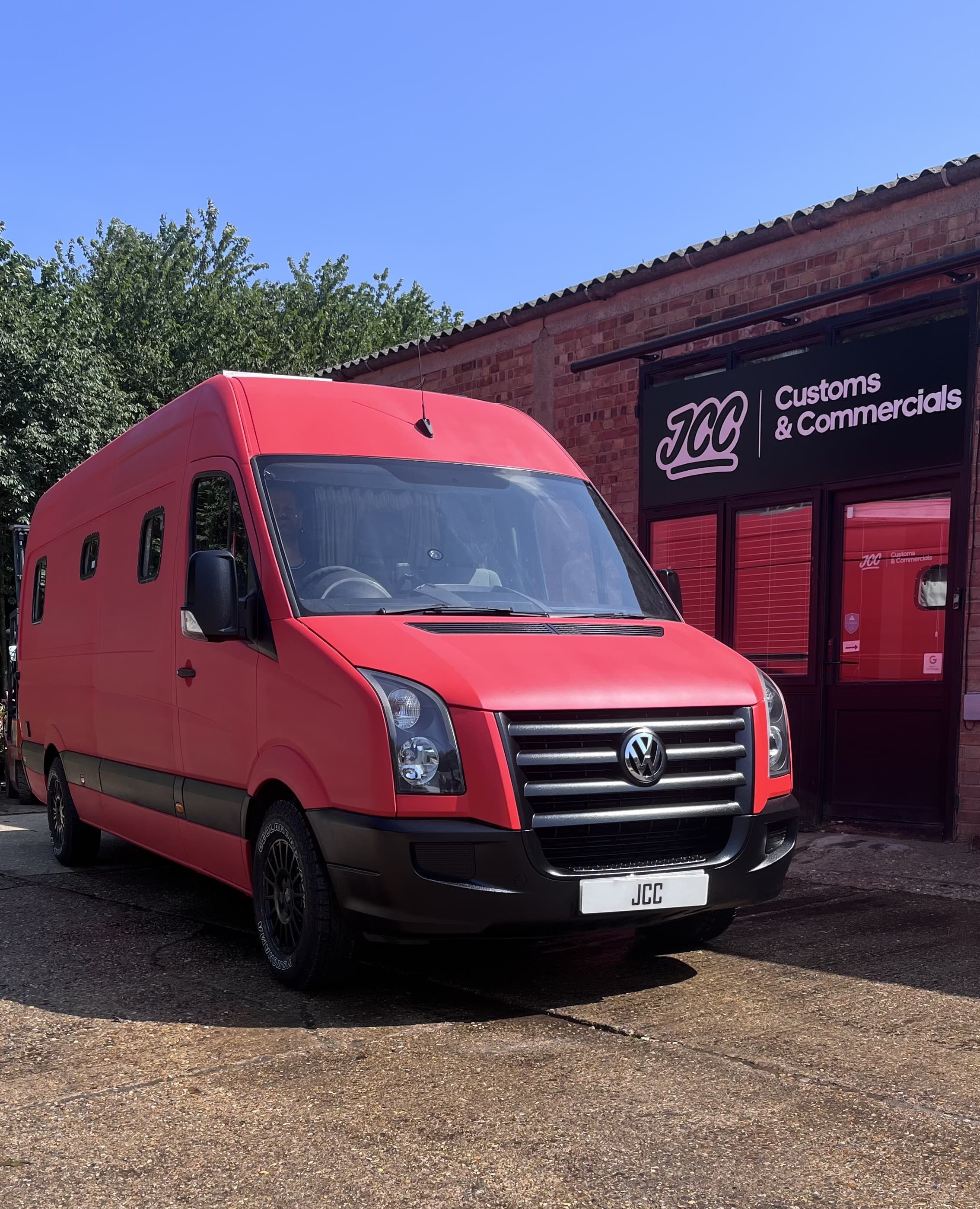 VW Crafter red with Raptor coating